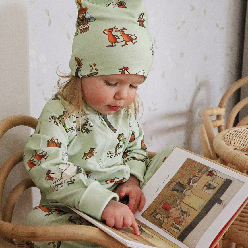 Girl wearing green pyjamas