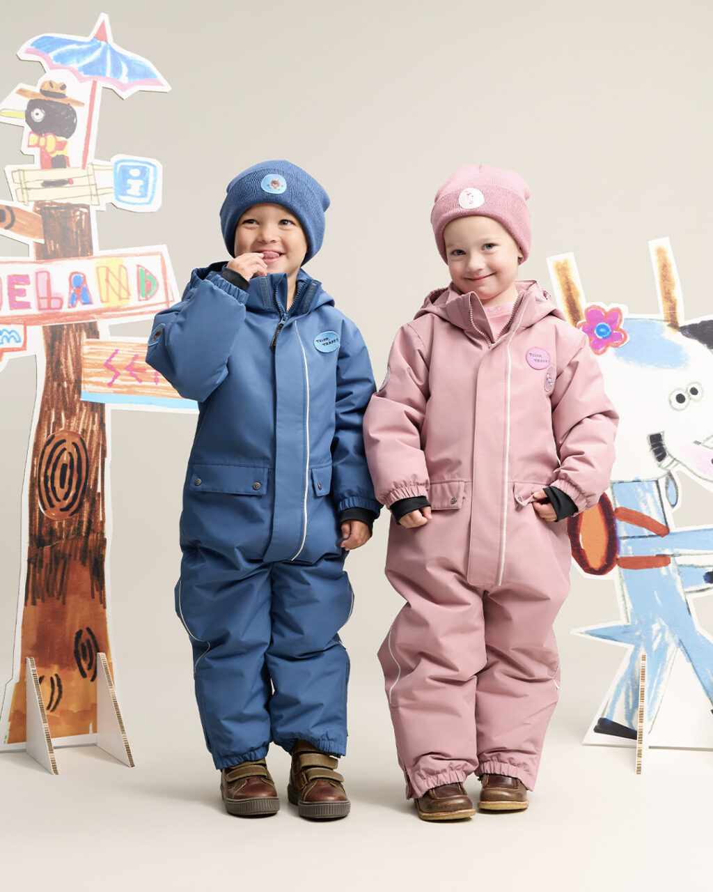 two children wearing gullkorn overalls