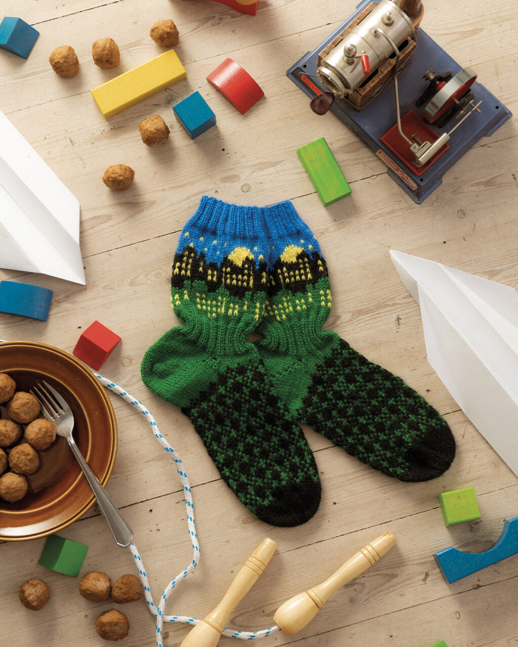 knitted socks inspired by Karlsson on the roof