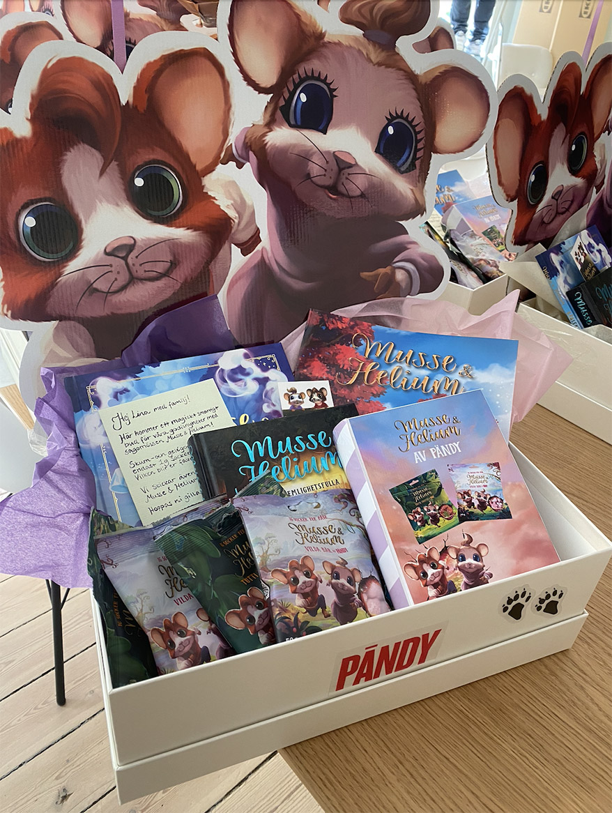 Box with Maxi & Helium books and candy